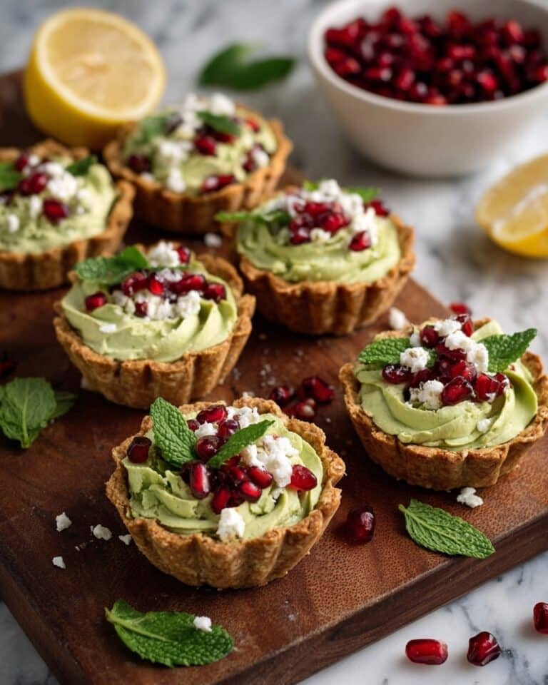 Tortilla Cups with Hummus Pesto, Feta, and Pomegranate Seeds Recipe